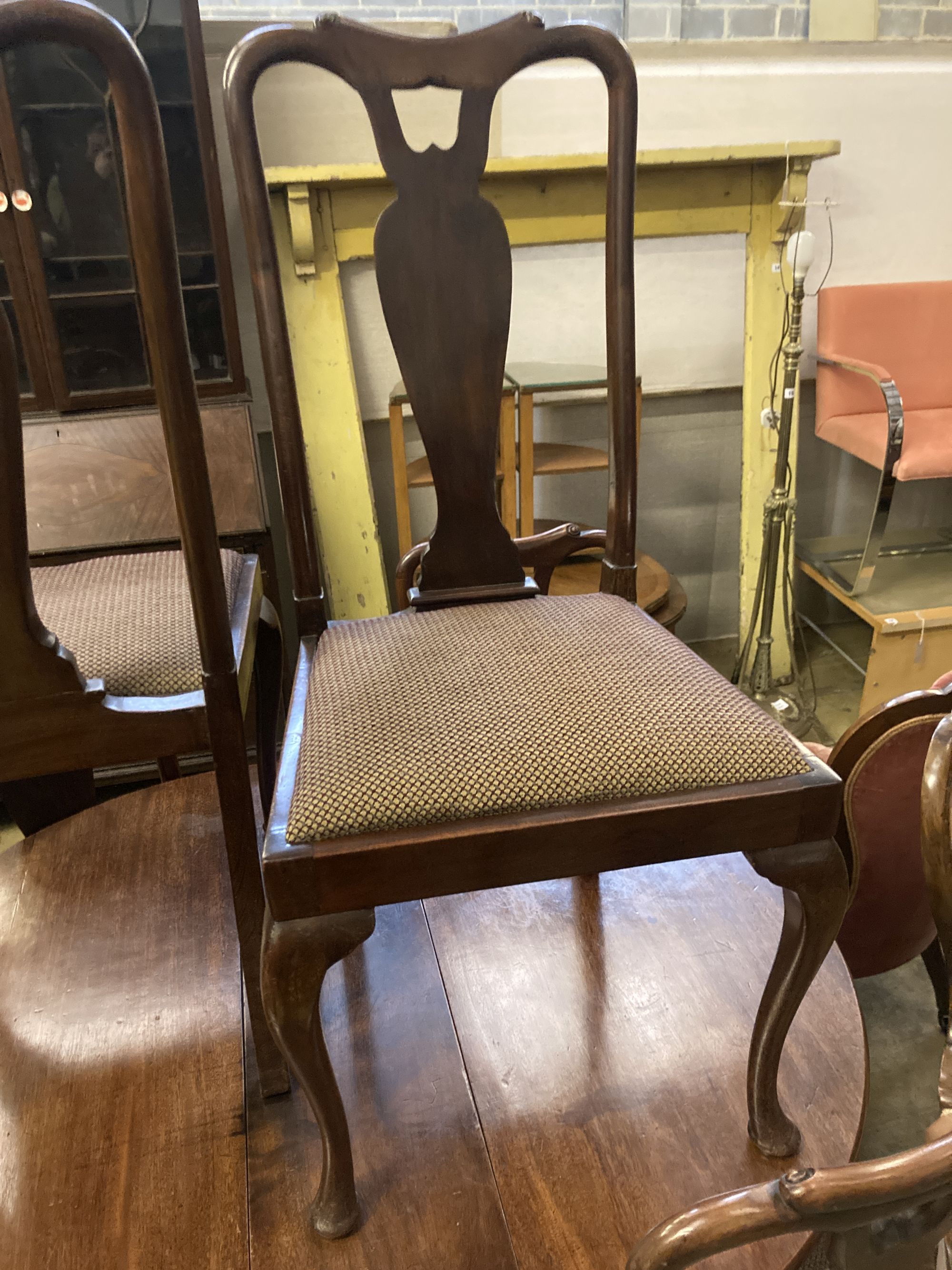 A set of eight early 20th century Queen Anne style mahogany dining chairs (two arm, six single)